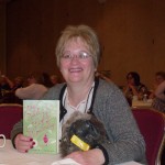 Mystery and Mirth Mingle at Malice Domestic 2009 with book